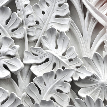 FX‑111 Ceramic Leaf Motif flexible marble panel featuring embossed white ceramic‑inspired tropical leaf and flower relief patterns with fine surface texture, by Dunya Home Design.