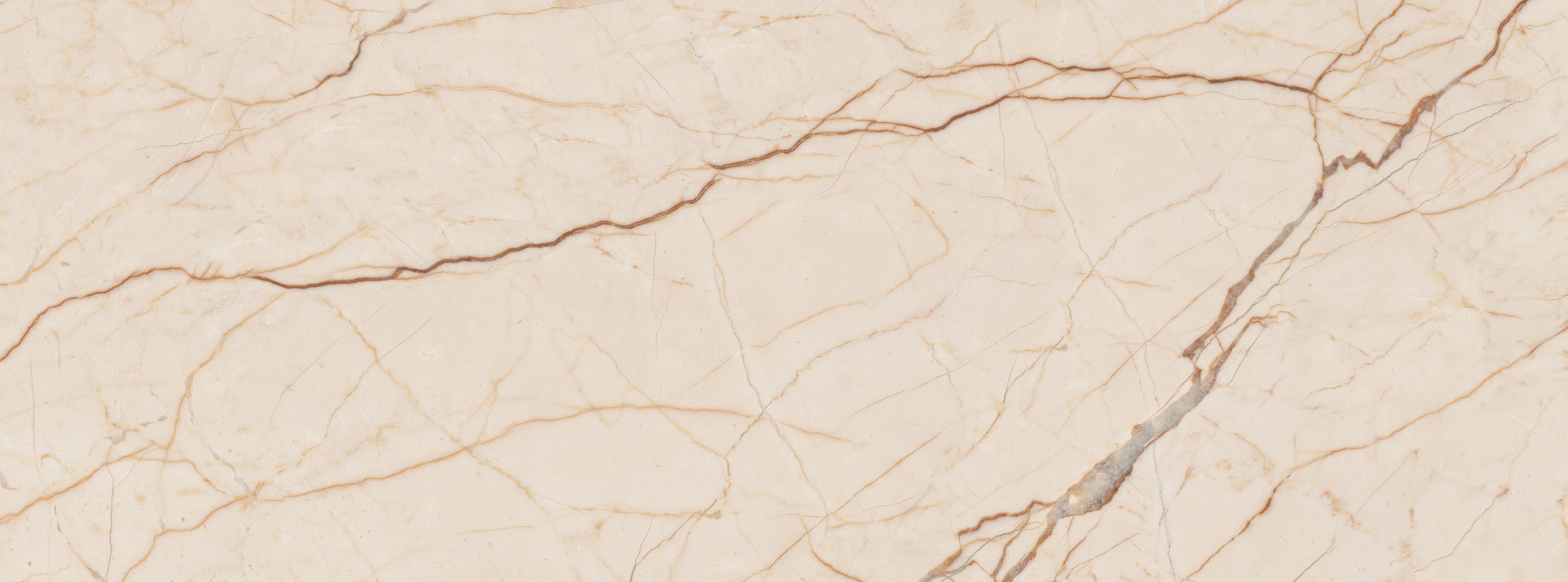 FX‑118 Cream Calacatta flexible marble panel showcasing a warm creamy beige background with delicate golden‑brown linear veining for an elegant marble pattern, by Dunya Home Design.