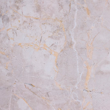 FX‑141 Honey Veil Marble flexible marble panel showcasing a soft blush‑grey background gently veined with delicate honey‑gold lines and subtle marbling textures, by Dunya Home Design