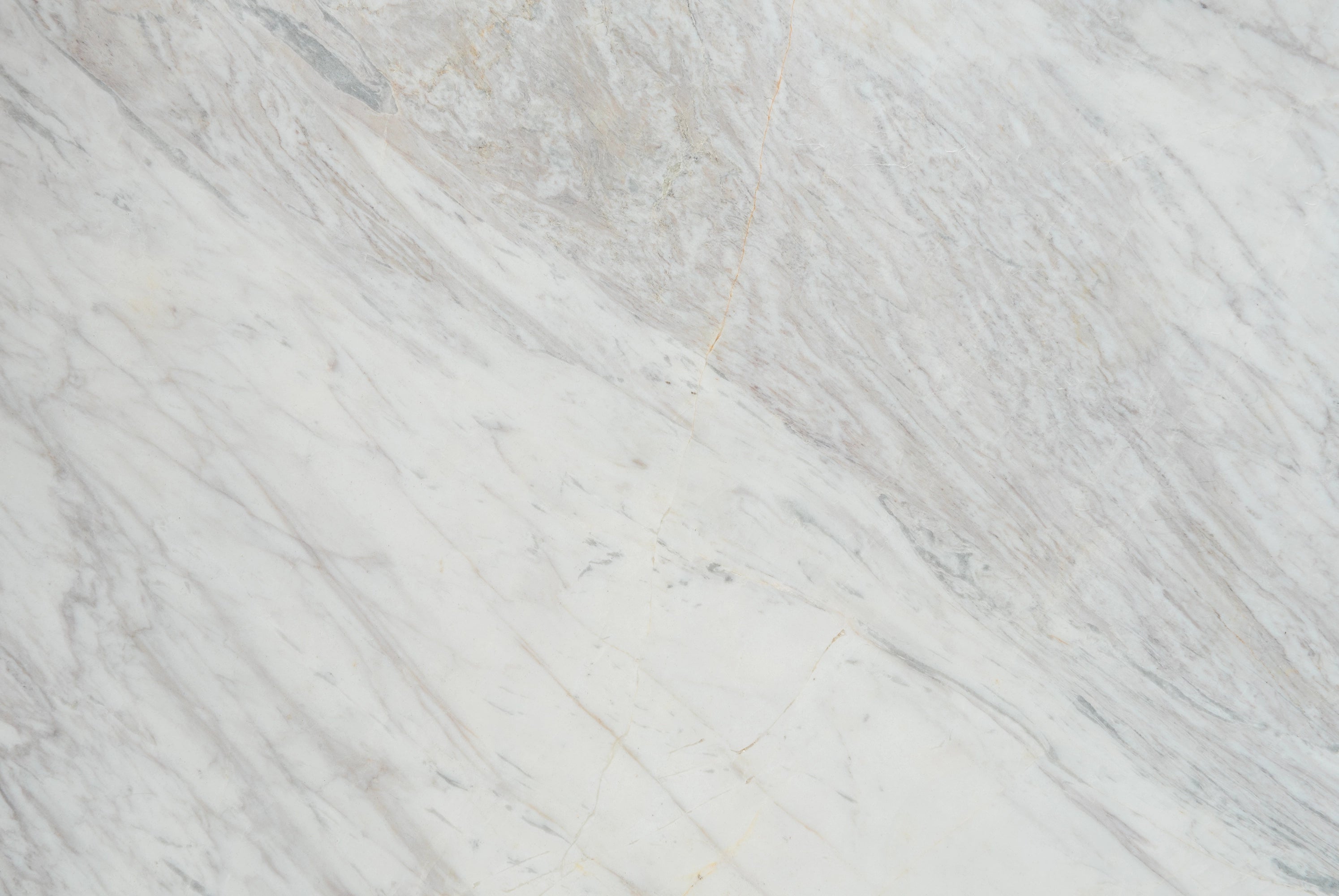“FX‑149 Arctic Drift Marble” flexible panel by Dunya Home Design: a cool white marble ground shot through with soft, brush‑stroke swaths of pale gray‑blue and taupe that fan out diagonally, accented by fine, delicate hairline veins of warm gold.