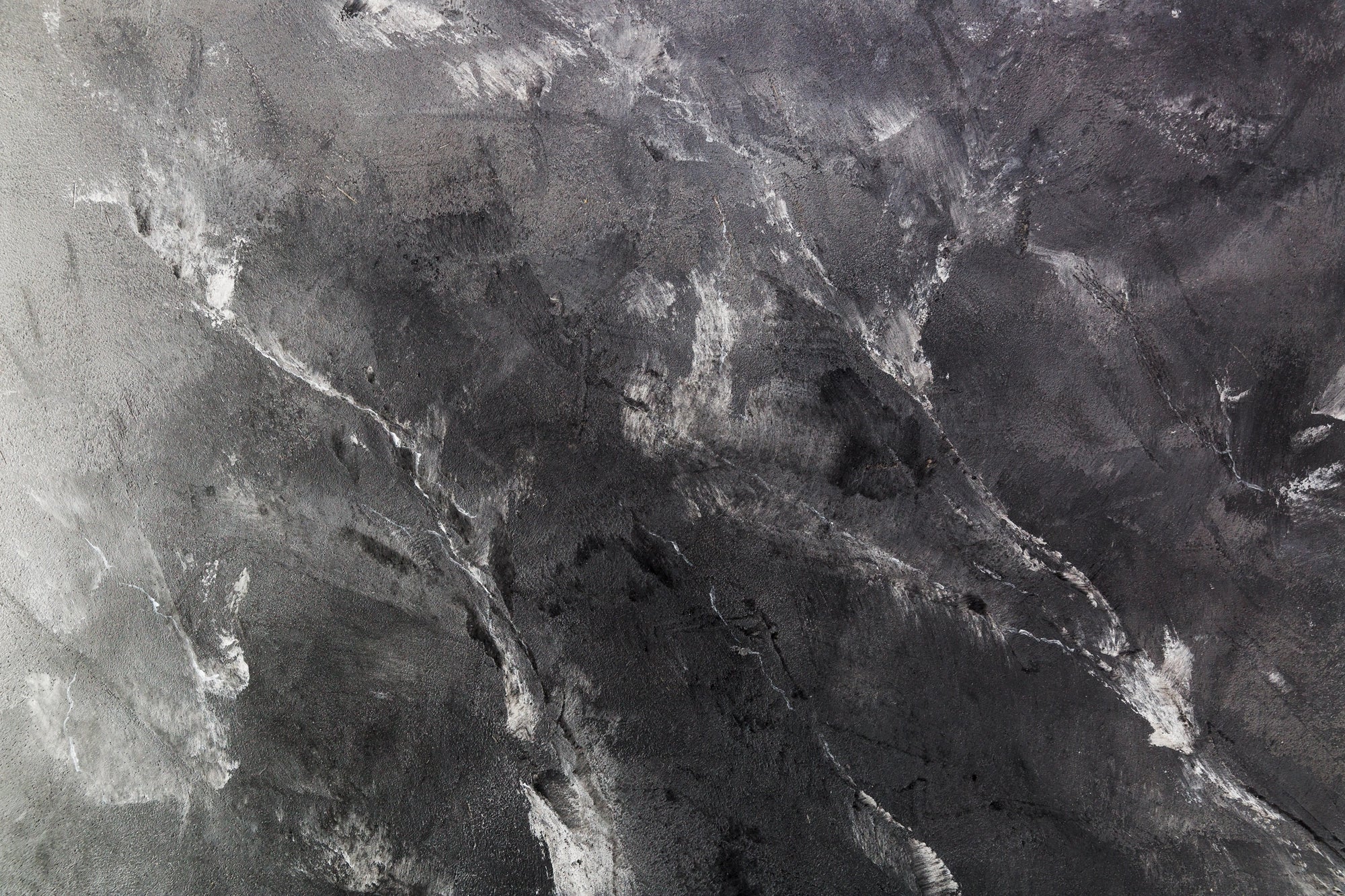 FX11 Slate Black flexible marble panel with dramatic charcoal and graphite texture, perfect for modern interiors or accent features.
