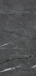 FX‑187 Midnight Rift Set flexible marble panel showcasing a deep charcoal‑black background with subtle slate‑grey texture and striking jagged white and silver-grey fissures that evoke the look of a dramatic nighttime rift, by Dunya Home Design.