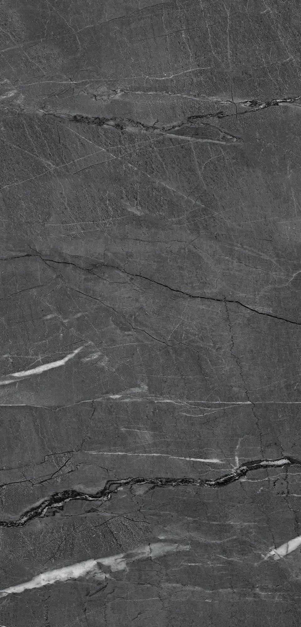FX‑187 Midnight Rift Set flexible marble panel showcasing a deep charcoal‑black background with subtle slate‑grey texture and striking jagged white and silver-grey fissures that evoke the look of a dramatic nighttime rift, by Dunya Home Design.