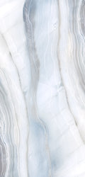 FX‑188 Glacial Mirage Set flexible marble panel showcasing a luminous white background with soft, translucent ice‑blue and silvery‑grey striations forming a mirrored, crystalline pattern reminiscent of frozen layers, by Dunya Home Design.