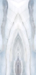 FX‑188 Glacial Mirage Set flexible marble panel showcasing a luminous white background with soft, translucent ice‑blue and silvery‑grey striations forming a mirrored, crystalline pattern reminiscent of frozen layers, by Dunya Home Design.