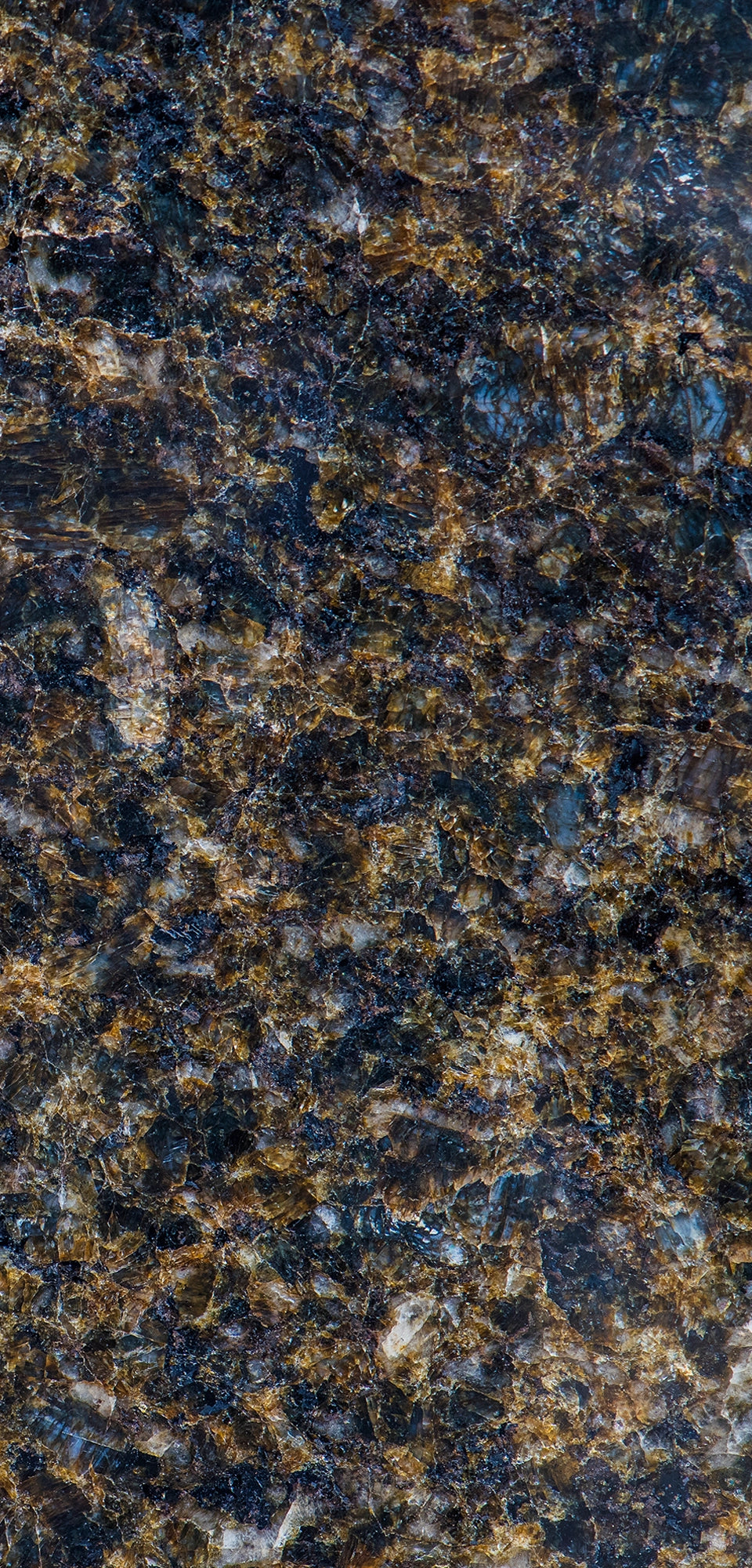 FX‑190 Midnight Ember Granite flexible granite panel showcasing a deep, near‑black background laced with iridescent midnight‑blue and smoky grey mineral flecks, interspersed with warm amber‑gold highlights that create a subtle, ember‑like glow, by Dunya Home Design.