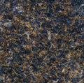 FX‑190 Midnight Ember Granite flexible granite panel showcasing a deep, near‑black background laced with iridescent midnight‑blue and smoky grey mineral flecks, interspersed with warm amber‑gold highlights that create a subtle, ember‑like glow, by Dunya Home Design.