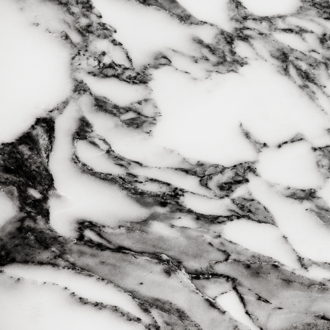 FX ‑ 158 Black Veined White Marble flexible marble panel showcasing a pristine white background crisscrossed with bold charcoal‑gray veining reminiscent of fine ink strokes, by Dunya Home Design.