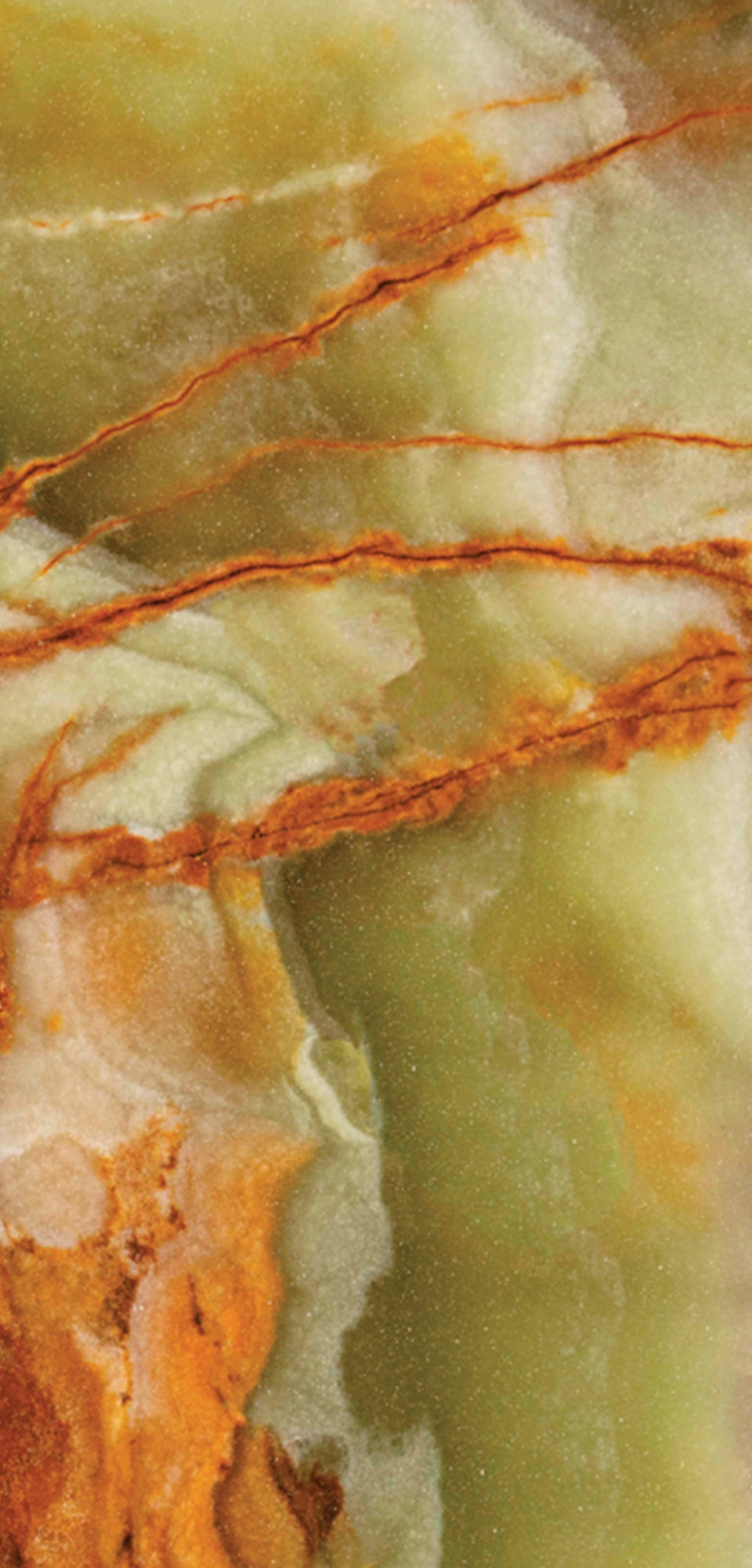 FX‑022 Onice Verde Fiamma flexible marble panel close‑up showing translucent olive‑green base with fiery orange‑red veins and creamy white banding, by Dunya Home Design