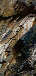 FX‑046 Natural Rock Beycik flexible marble panel showcasing rugged stratified rock layers in rich browns, grays, and rust tones with realistic fissures and texture printing, by Dunya Home Design.