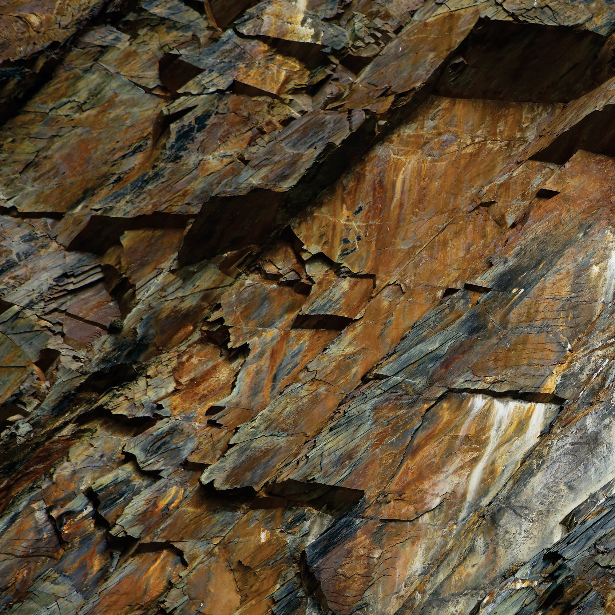 FX‑046 Natural Rock Beycik flexible marble panel showcasing rugged stratified rock layers in rich browns, grays, and rust tones with realistic fissures and texture printing, by Dunya Home Design.