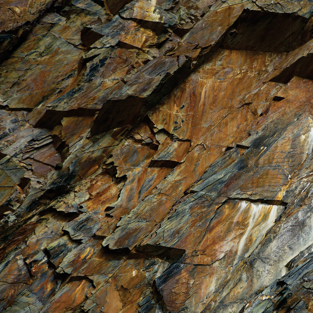 FX‑046 Natural Rock Beycik flexible marble panel showcasing rugged stratified rock layers in rich browns, grays, and rust tones with realistic fissures and texture printing, by Dunya Home Design.