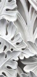 FX‑111 Ceramic Leaf Motif flexible marble panel featuring embossed white ceramic‑inspired tropical leaf and flower relief patterns with fine surface texture, by Dunya Home Design.