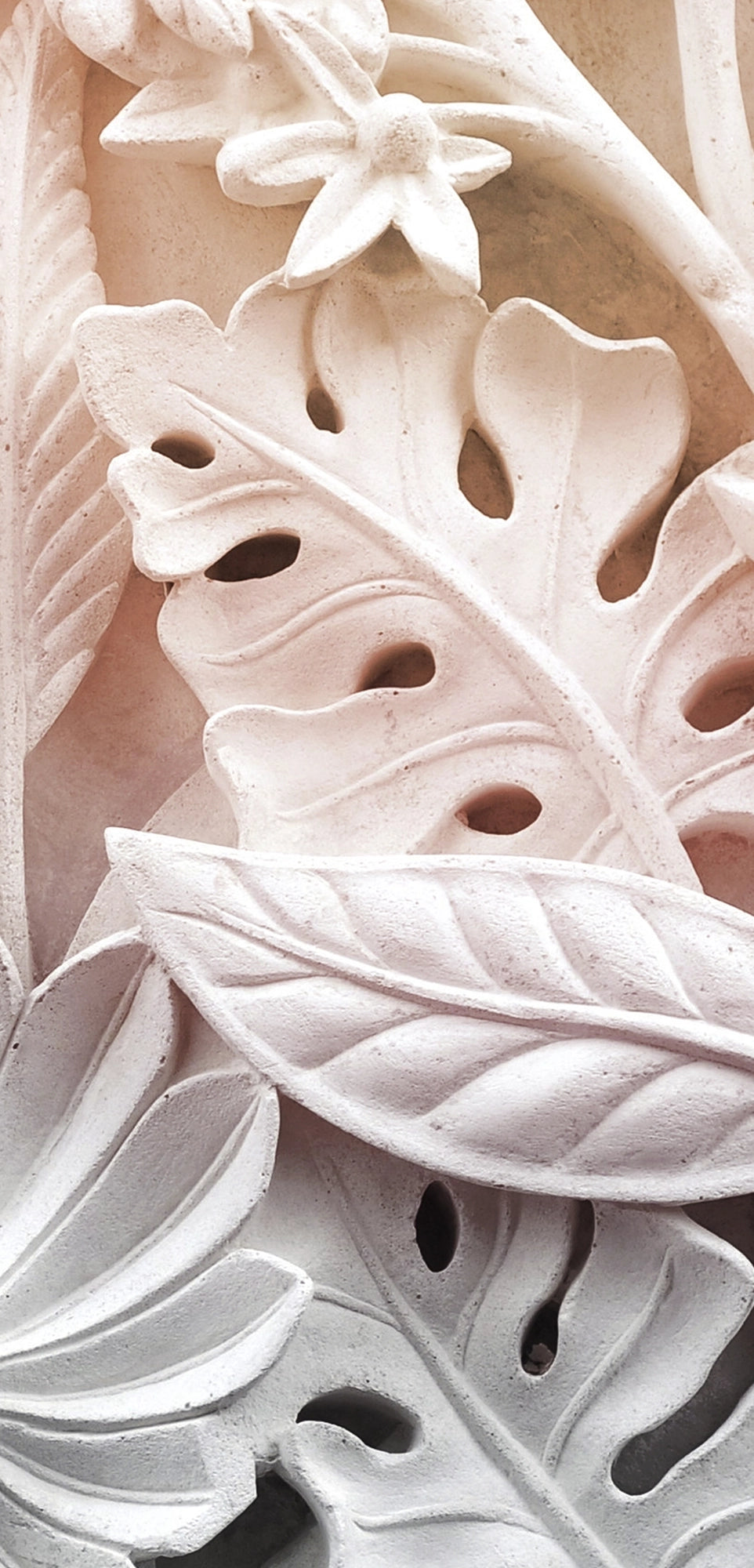 FX‑111 Ceramic Leaf Motif flexible marble panel featuring embossed white ceramic‑inspired tropical leaf and flower relief patterns with fine surface texture, by Dunya Home Design.