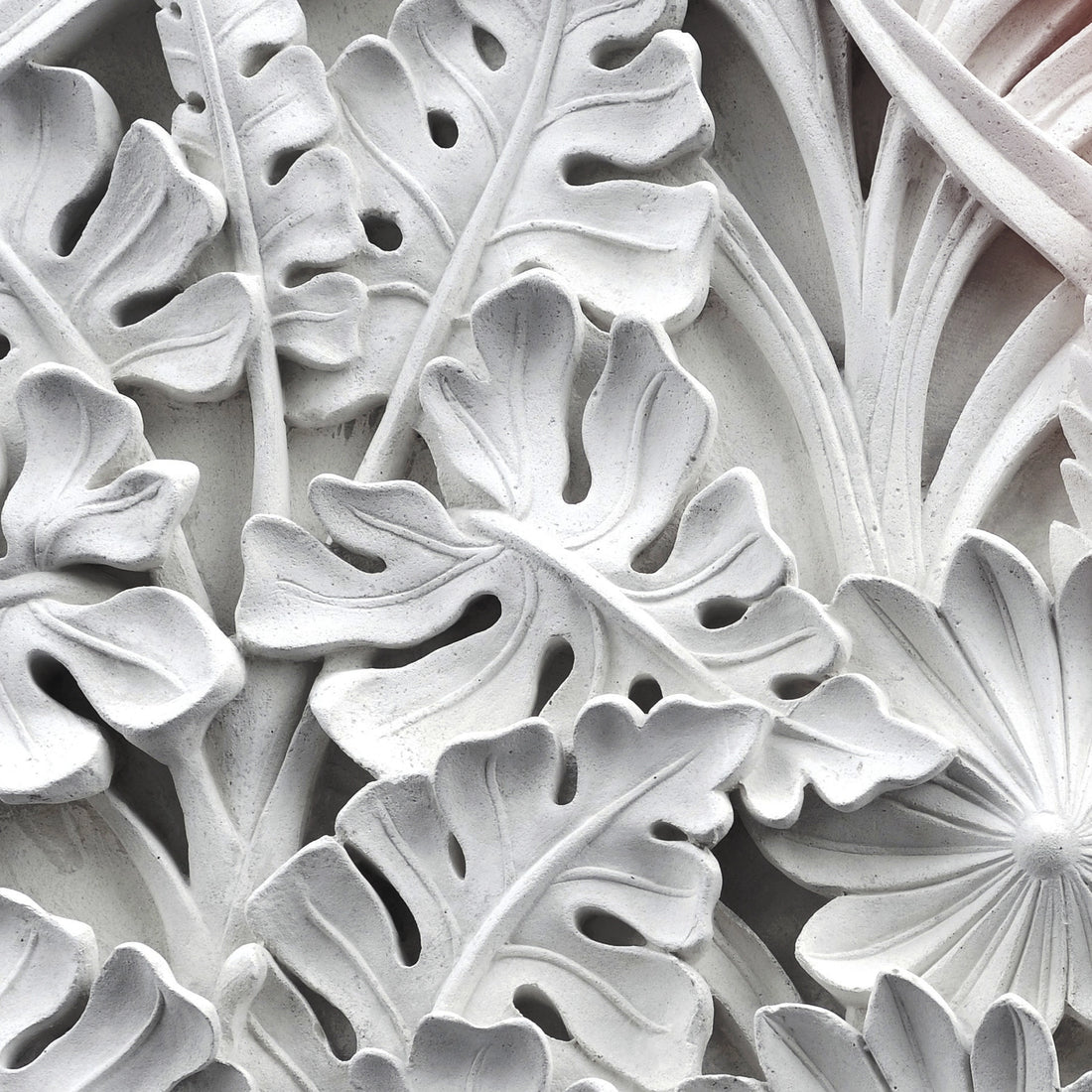 FX‑111 Ceramic Leaf Motif flexible marble panel featuring embossed white ceramic‑inspired tropical leaf and flower relief patterns with fine surface texture, by Dunya Home Design.