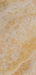 FX‑113 Golden Luxury flexible marble panel showcasing warm honey‑gold crystalline onyx textures with layered translucent bands and subtle white veining, by Dunya Home Design.