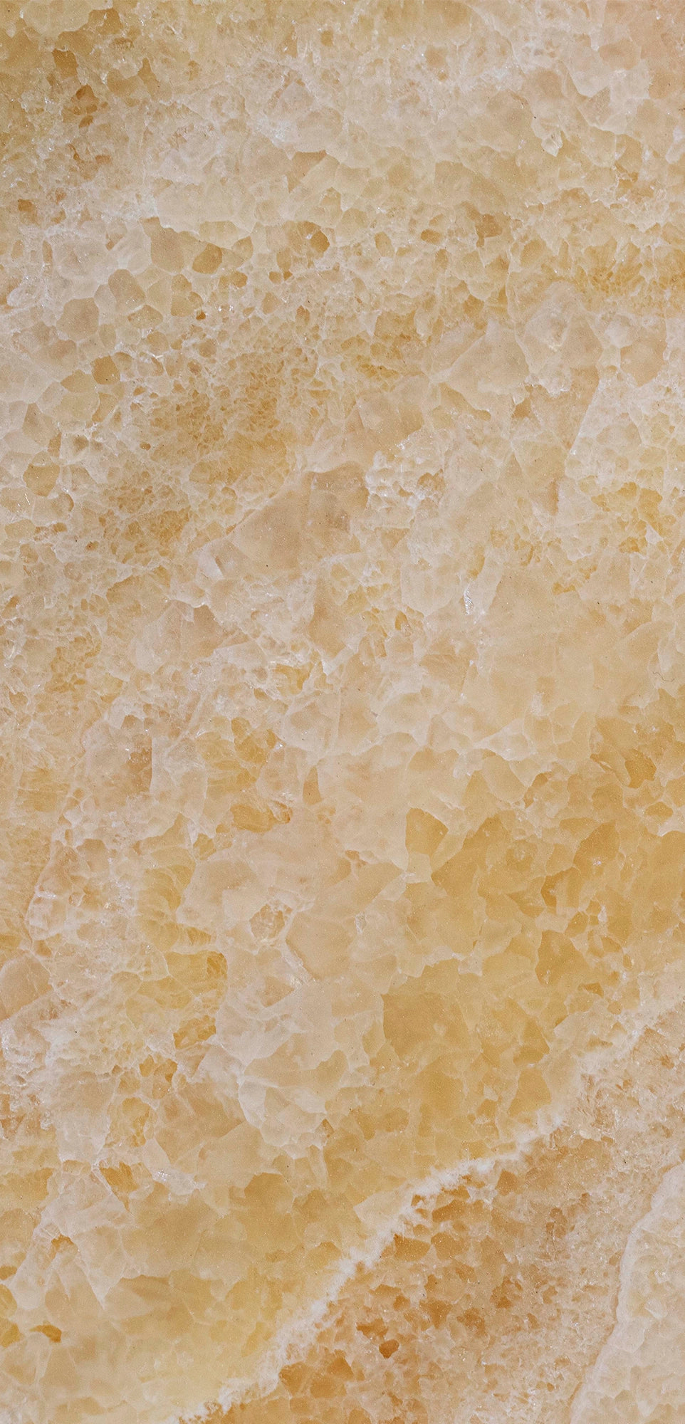 FX‑113 Golden Luxury flexible marble panel showcasing warm honey‑gold crystalline onyx textures with layered translucent bands and subtle white veining, by Dunya Home Design.