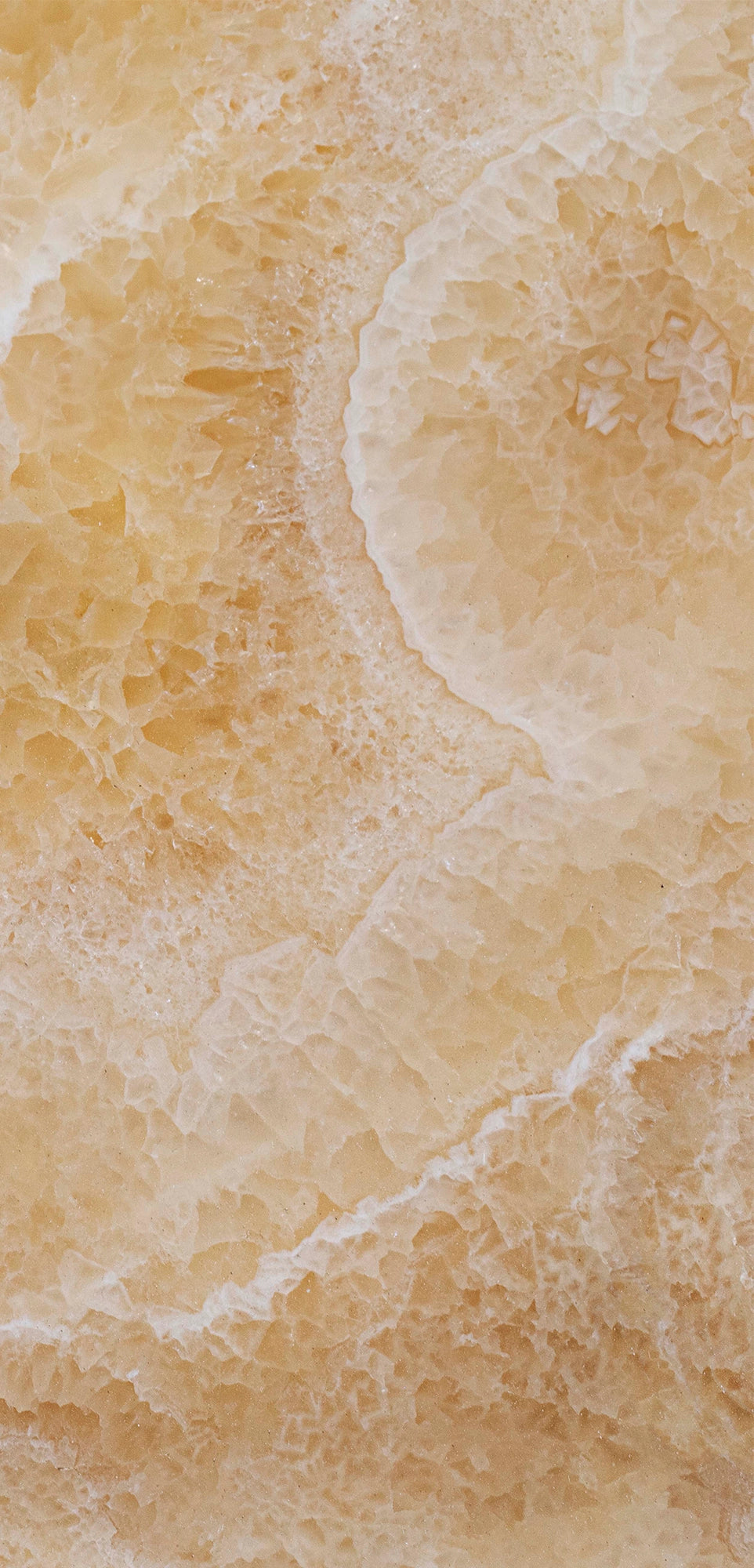 FX‑113 Golden Luxury flexible marble panel showcasing warm honey‑gold crystalline onyx textures with layered translucent bands and subtle white veining, by Dunya Home Design.