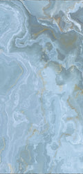 FX‑132 Ocean Crest Marble flexible marble panel showcasing soothing ocean‑blue and soft gray swirling onyx patterns highlighted with subtle sandy beige accents, by Dunya Home Design.