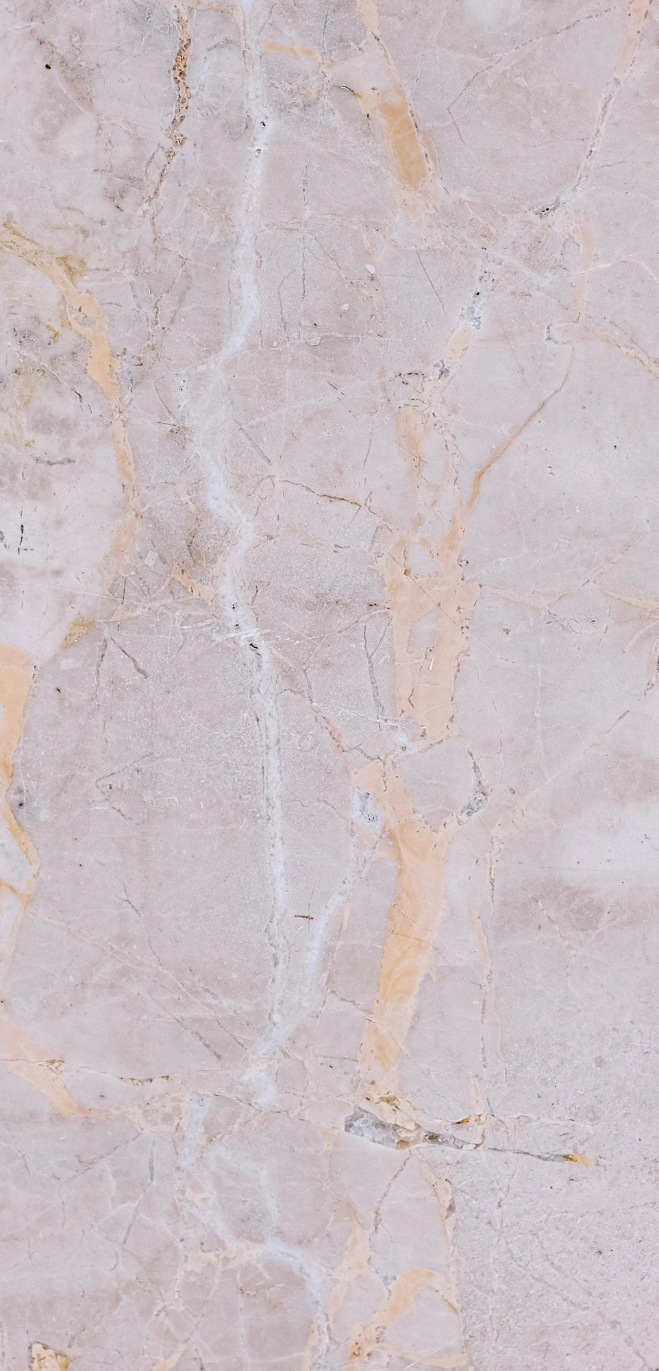 FX‑141 Honey Veil Marble flexible marble panel showcasing a soft blush‑grey background gently veined with delicate honey‑gold lines and subtle marbling textures, by Dunya Home Design