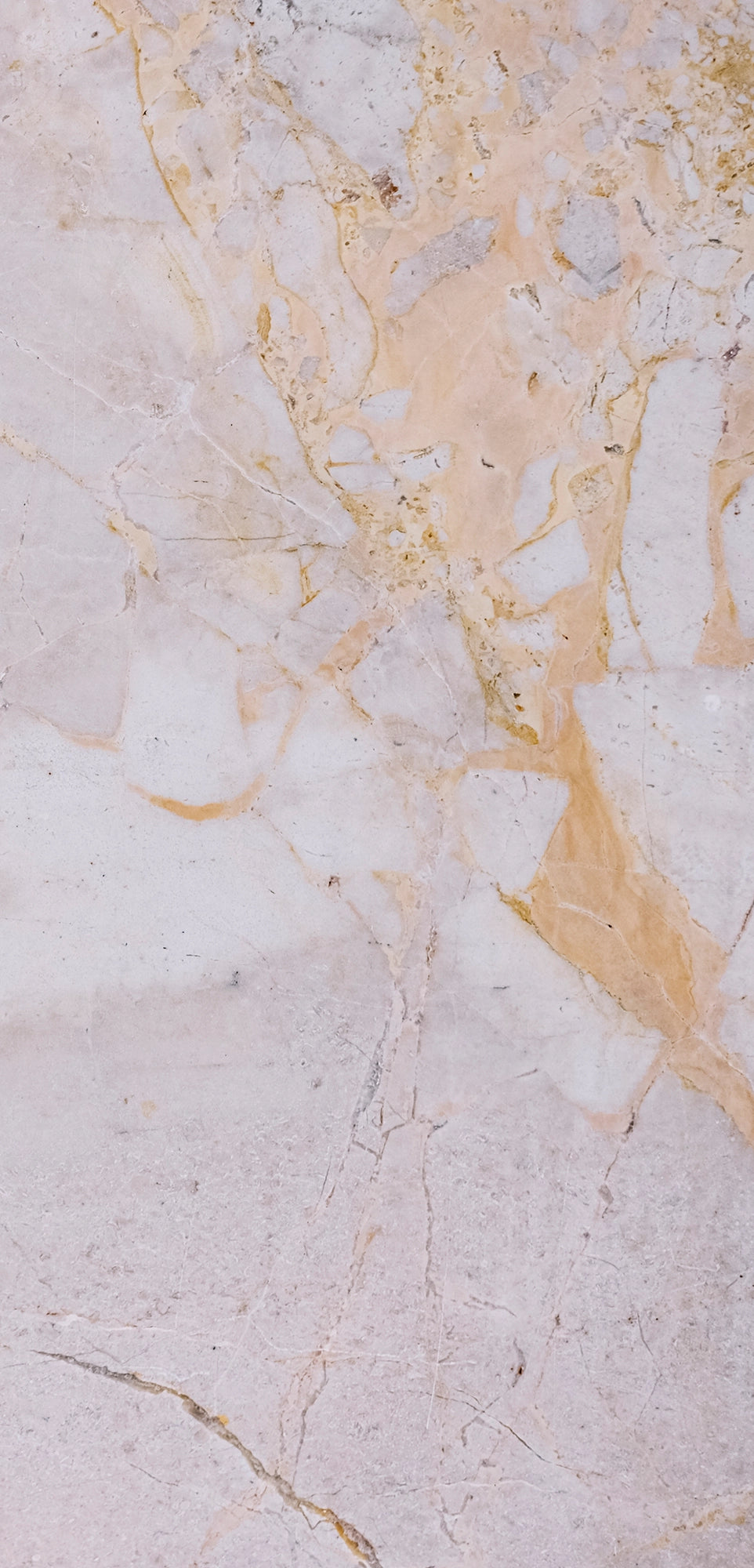 FX‑141 Honey Veil Marble flexible marble panel showcasing a soft blush‑grey background gently veined with delicate honey‑gold lines and subtle marbling textures, by Dunya Home Design
