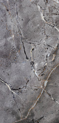 FX‑142 Iron Vein Marble flexible marble panel featuring a cool mid‑grey base streaked with bold white and rust‑orange veins, accented by fine iron‑speckled textures for an industrial yet elegant look, by Dunya Home Design.