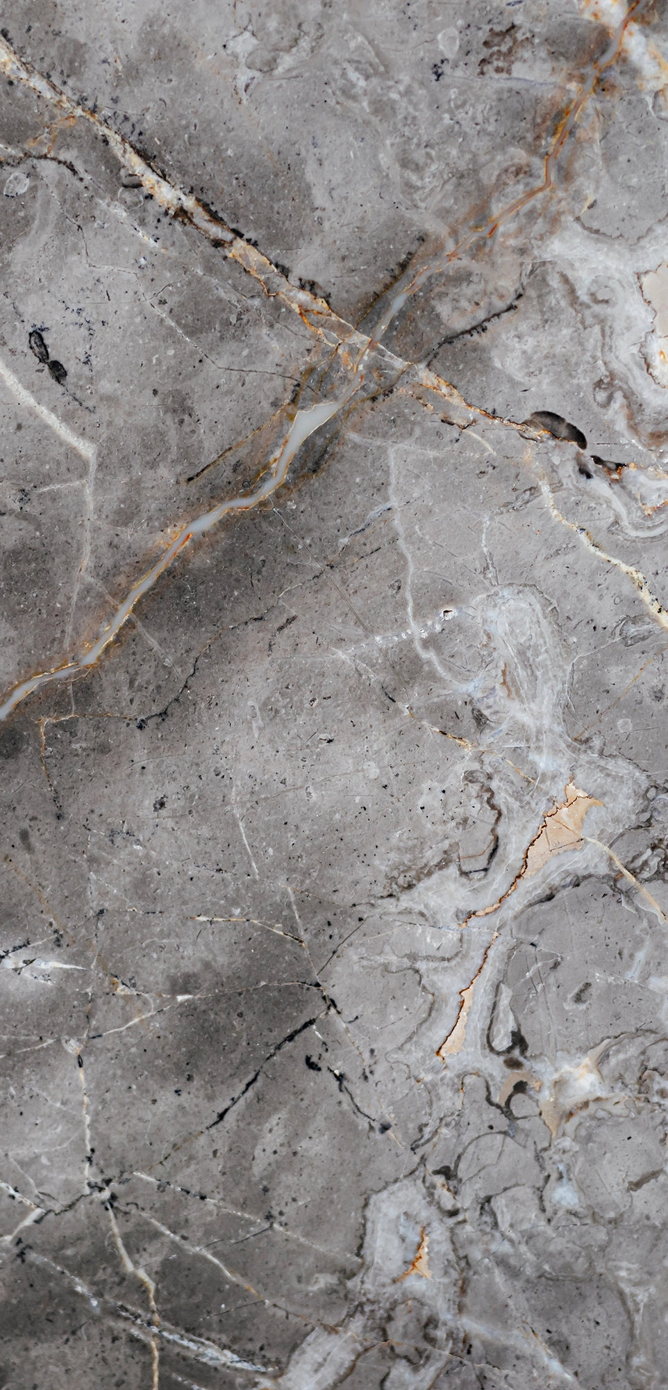 FX‑142 Iron Vein Marble flexible marble panel featuring a cool mid‑grey base streaked with bold white and rust‑orange veins, accented by fine iron‑speckled textures for an industrial yet elegant look, by Dunya Home Design.