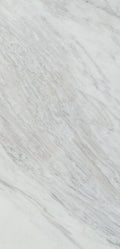 “FX‑149 Arctic Drift Marble” flexible panel by Dunya Home Design: a cool white marble ground shot through with soft, brush‑stroke swaths of pale gray‑blue and taupe that fan out diagonally, accented by fine, delicate hairline veins of warm gold.