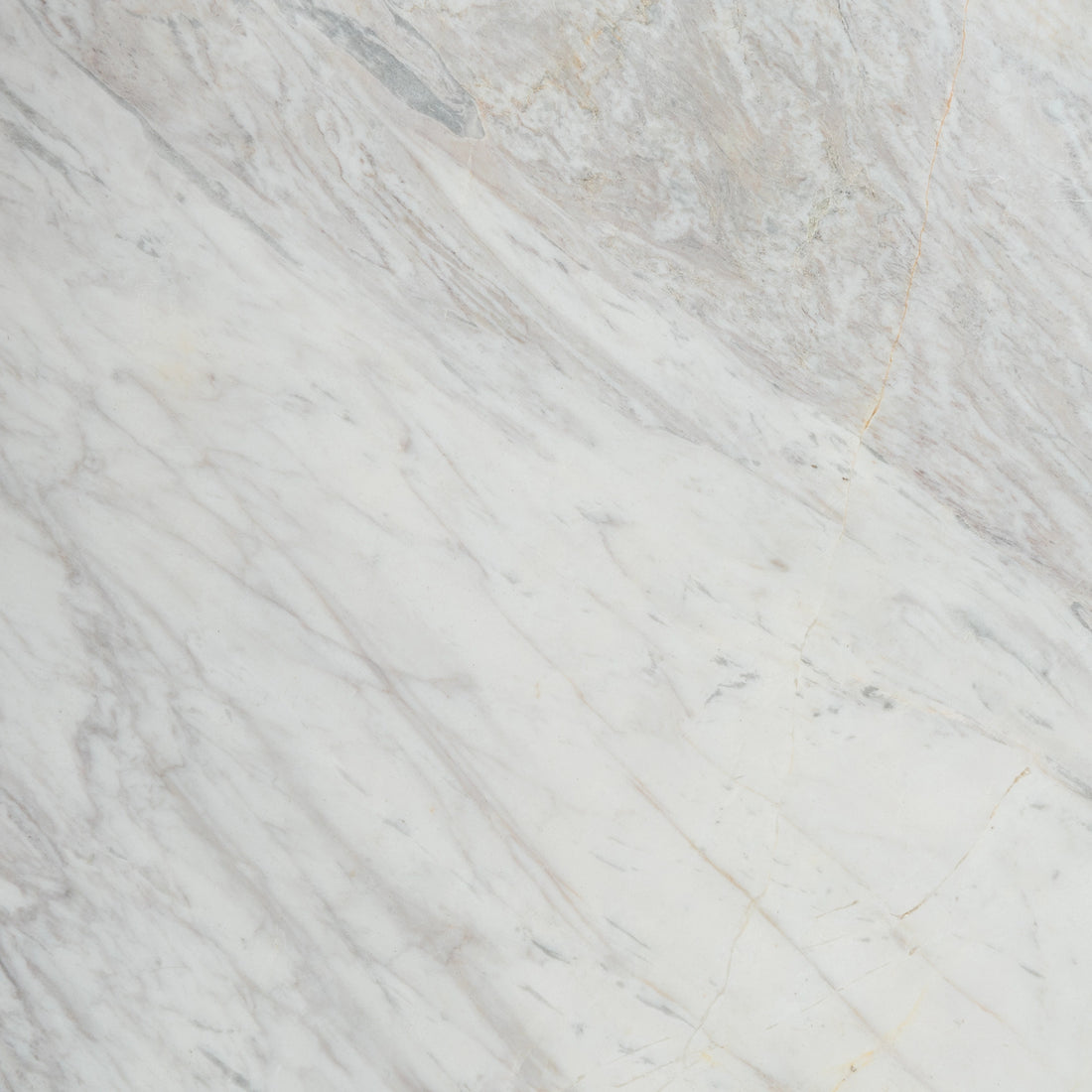 “FX‑149 Arctic Drift Marble” flexible panel by Dunya Home Design: a cool white marble ground shot through with soft, brush‑stroke swaths of pale gray‑blue and taupe that fan out diagonally, accented by fine, delicate hairline veins of warm gold.