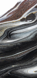 “FX‑152 Obsidian Flow Marble” flexible panel by Dunya Home Design: a dynamic, fluid pattern of swirling deep black base streaked with metallic silver and warm copper‑gold accents, creating a glossy, marble‑like surface with glittering, flowing veins.
