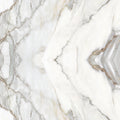 FX ‑ 180 Auric Prism Calacatta Marble flexible marble panel showcasing a luminous white Calacatta background book‑matched into a central diamond prism motif with soft gray and warm gold veins radiating outward like molten metal highlights, by Dunya Home Design.
