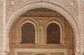 FX‑184 Arabesque Filigree Marble flexible marble panel showcasing a symmetrical Moorish arch motif filled with intricate, lace‑like arabesque carving in warm sandstone‑beige hues, by Dunya Home Design.
