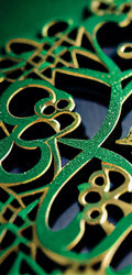  Sparkling green clover centerpiece with gold-accented Celtic motifs — FX162 Clover by Dunya Home Design.