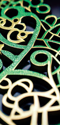  Sparkling green clover centerpiece with gold-accented Celtic motifs — FX162 Clover by Dunya Home Design.