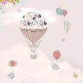 Whimsical pastel-themed marble panel featuring illustrated bunnies floating with balloons, a floral hot air balloon, birds, and dreamy clouds on a soft pink background