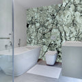  FX32 Borticello flexible marble panel featuring intricate black and grey veining over a light grey stone surface.