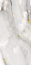 Radiant white marble with rich gold veining — FX38 Calacatta Gold by Dunya Home Design.